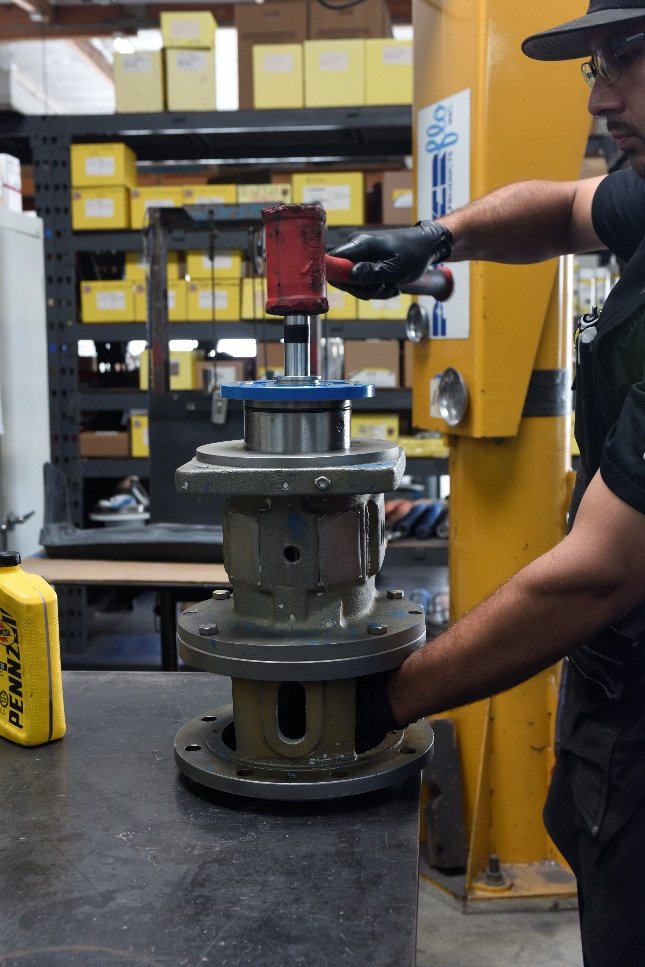 Bearing being pressed and seated on the shaft